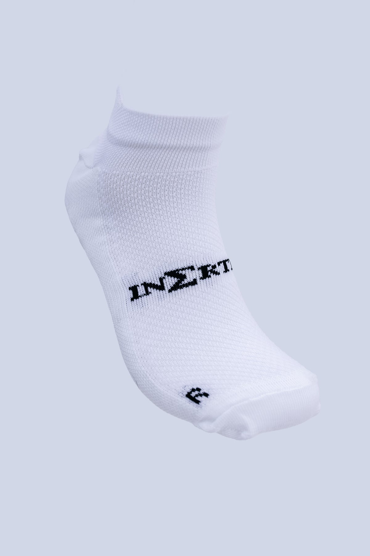 Inertia trainer grip socks in white, front view